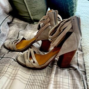 Gray suede sandals with a cute open back and adjustable straps.#LuckyBrand.